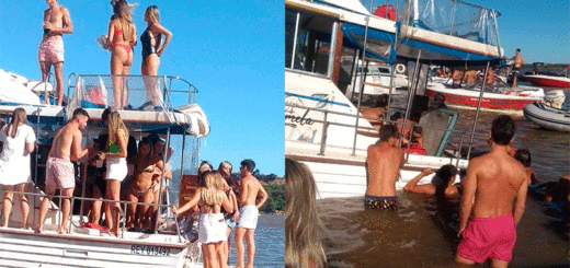 alt="barco con jóvenes en el río Paraná"