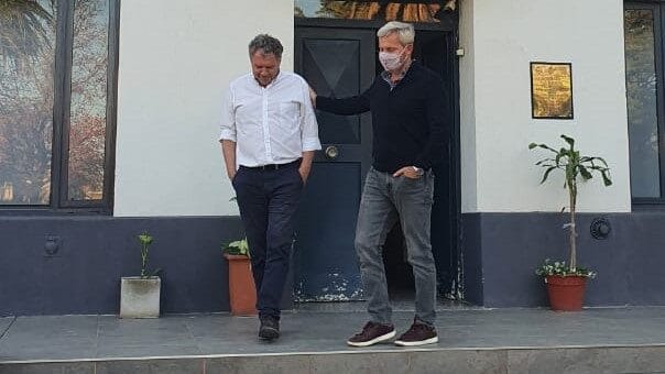 alt="Galimberti y Frigerio a la salida de la última reunión que mantuvieron el mes pasado"