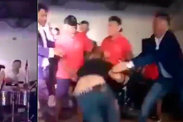 alt="El esposo de la fanática subió al escenario, fuera de sí, para agredir a Lozano"