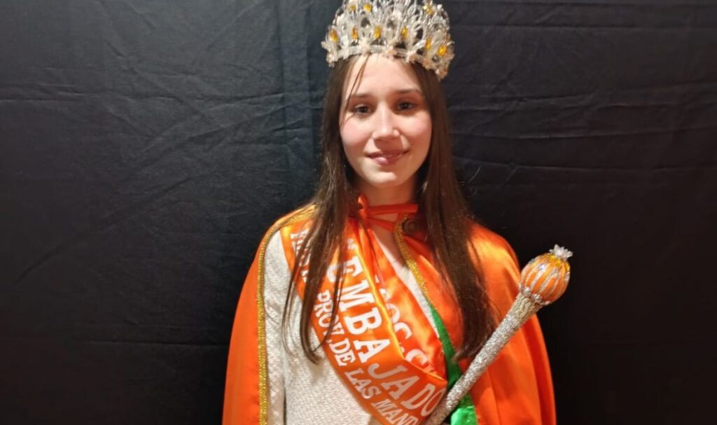 alt="en la fotografía se ve a Lucía Milagros Cornaló tras ser electa Embajadora del Pueblo de las Mandarinas"