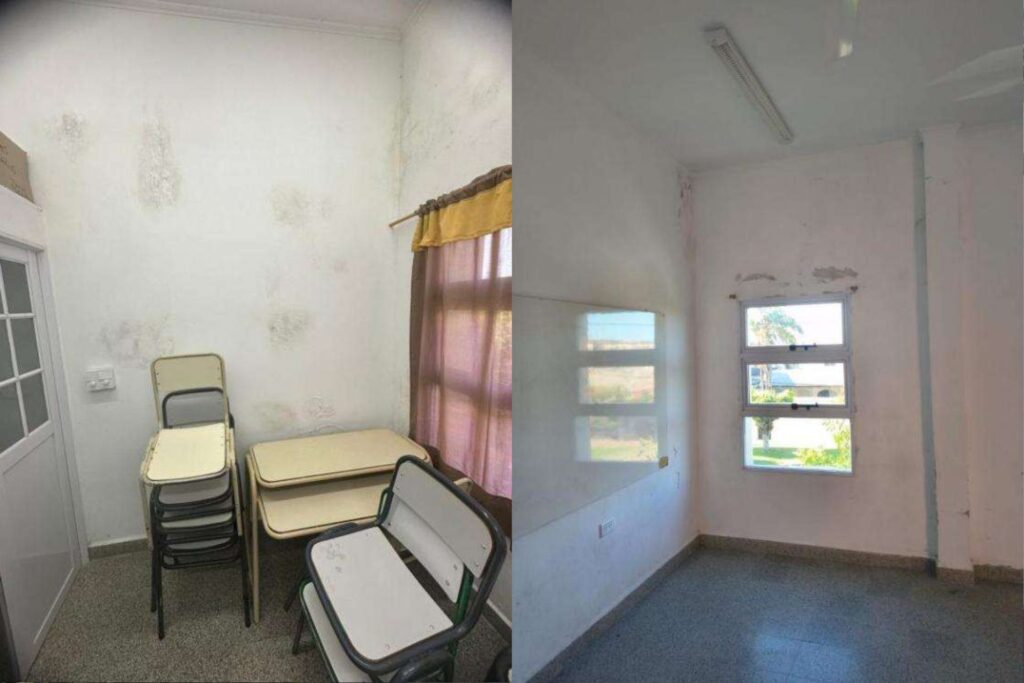 alt="Aulas con paredes deterioradas por la humedad y pintura saltada antes de comenzar las obras en la escuela Güemes de Concordia"