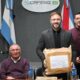 alt="Acto oficial de apertura de sobres para licitación de obras escolares en Concordia con la presencia de autoridades de CAFESG y el municipio"
