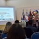 alt="Matías Sebely disertando sobre herramientas para el desarrollo emprendedor local junto a la presentación del modelo EMNEA en Concordia"